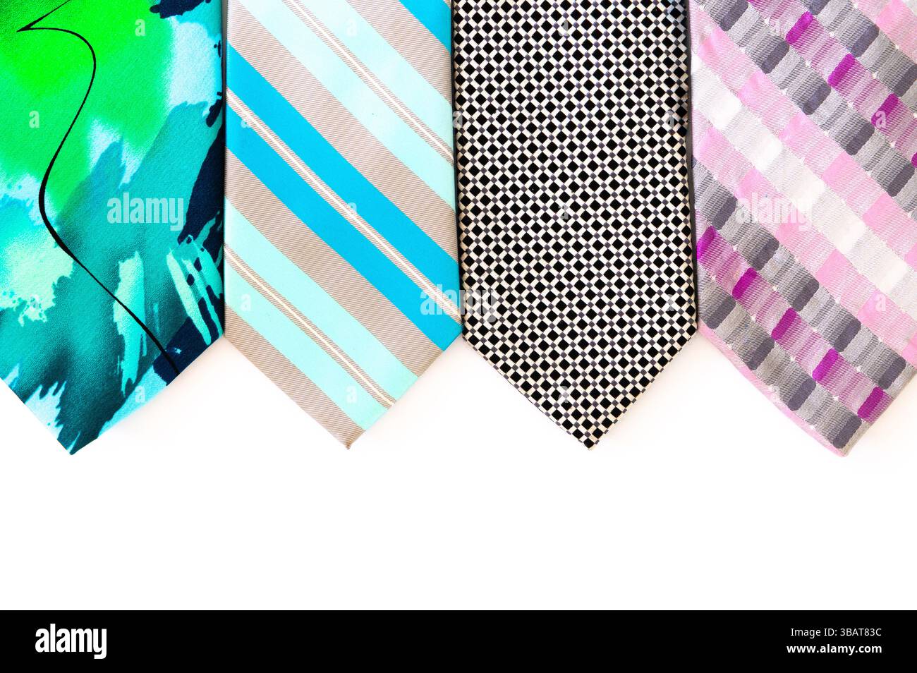 Four neckties lined up on a white background Stock Photo
