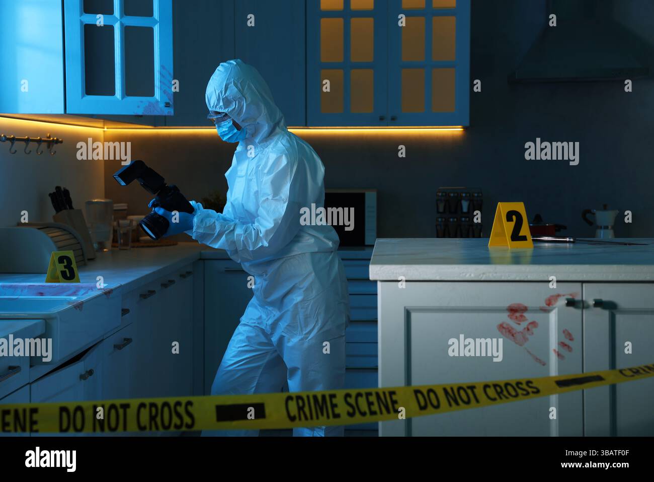 Forensic expert with camera working at crime scene in dark room Stock ...