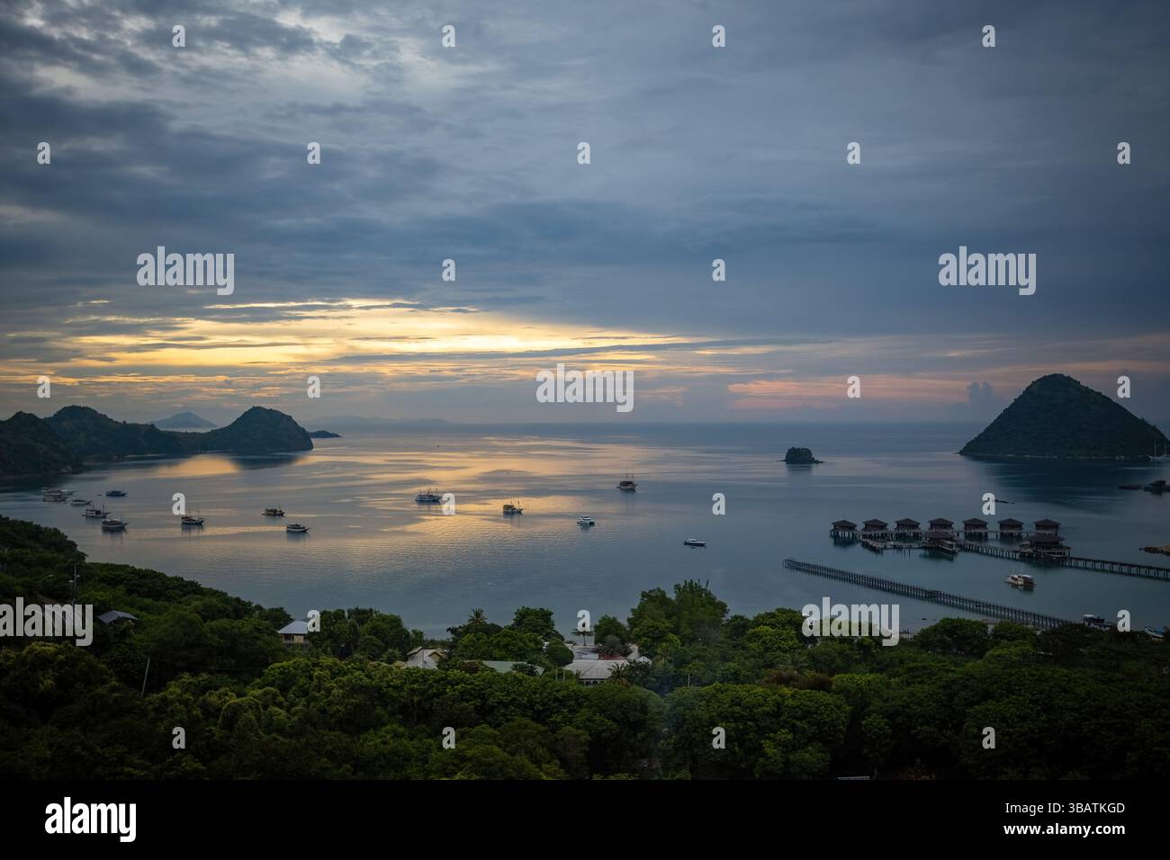 Breathtaking sunset over the harbor in Labuan Bajo Komodo Indonesia ...