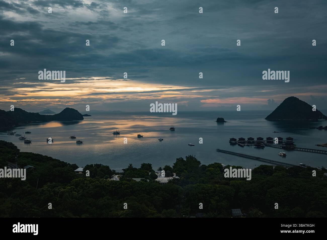 Breathtaking sunset over the harbor in Labuan Bajo Komodo Indonesia ...