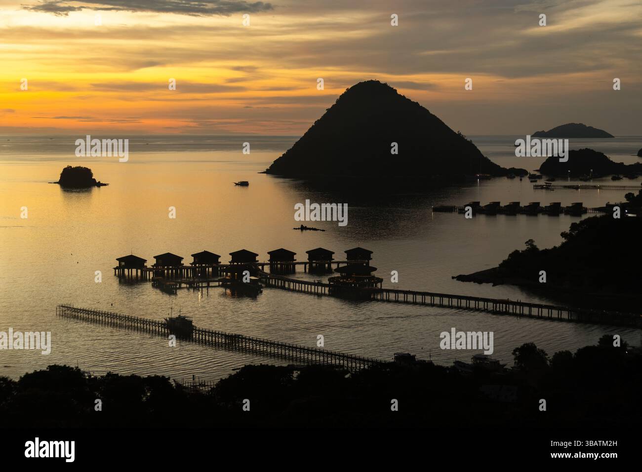 Breathtaking sunset over the harbor in Labuan Bajo Komodo Indonesia ...