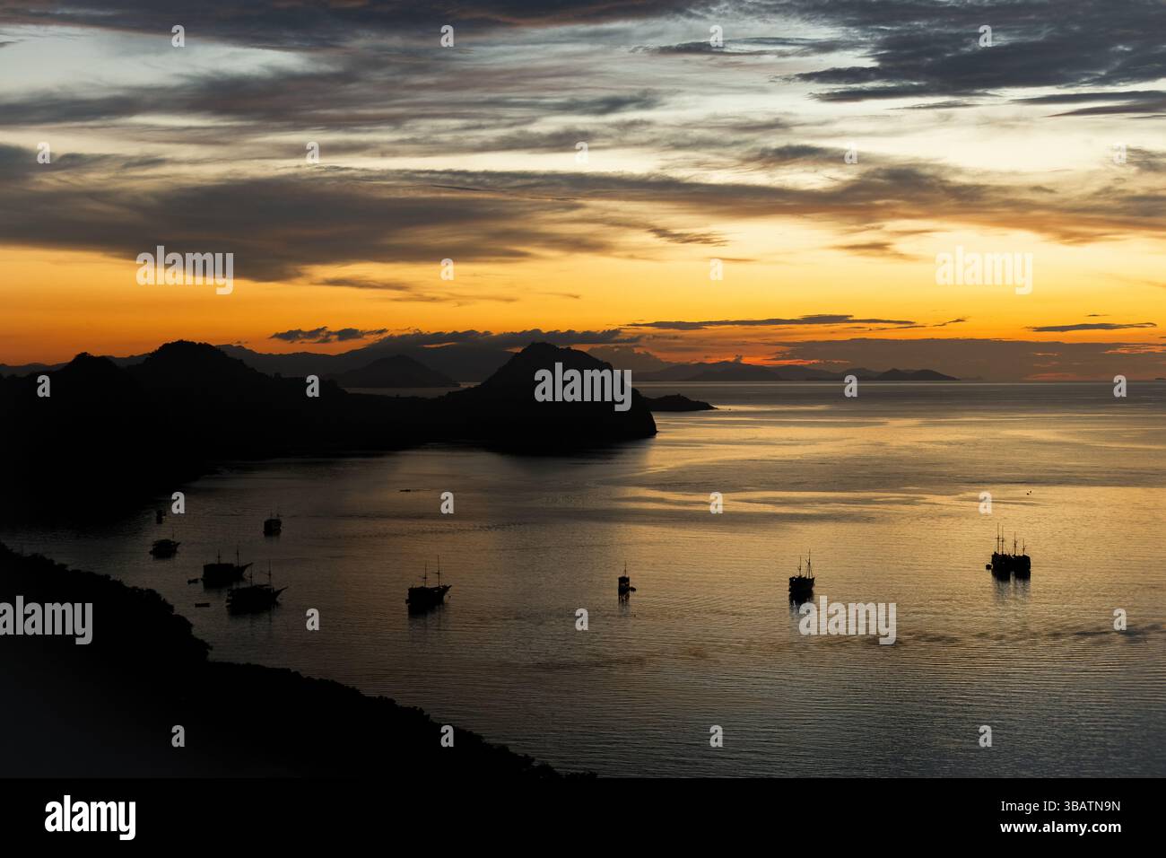 Breathtaking sunset over the harbor in Labuan Bajo Komodo Indonesia ...