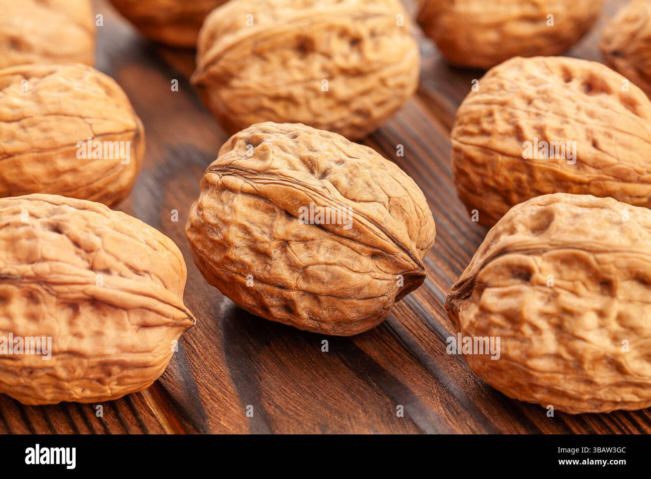 walnuts group on wood background Stock Photo