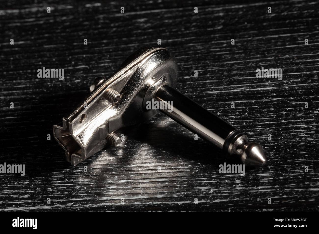 ts cable plug on black wood background Stock Photo
