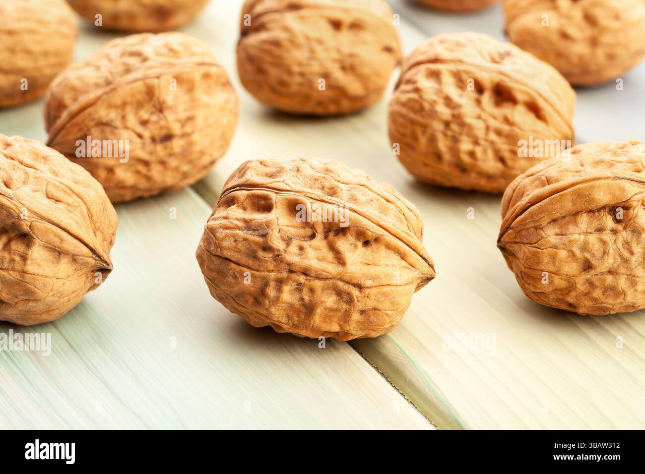 walnuts group on wood background Stock Photo