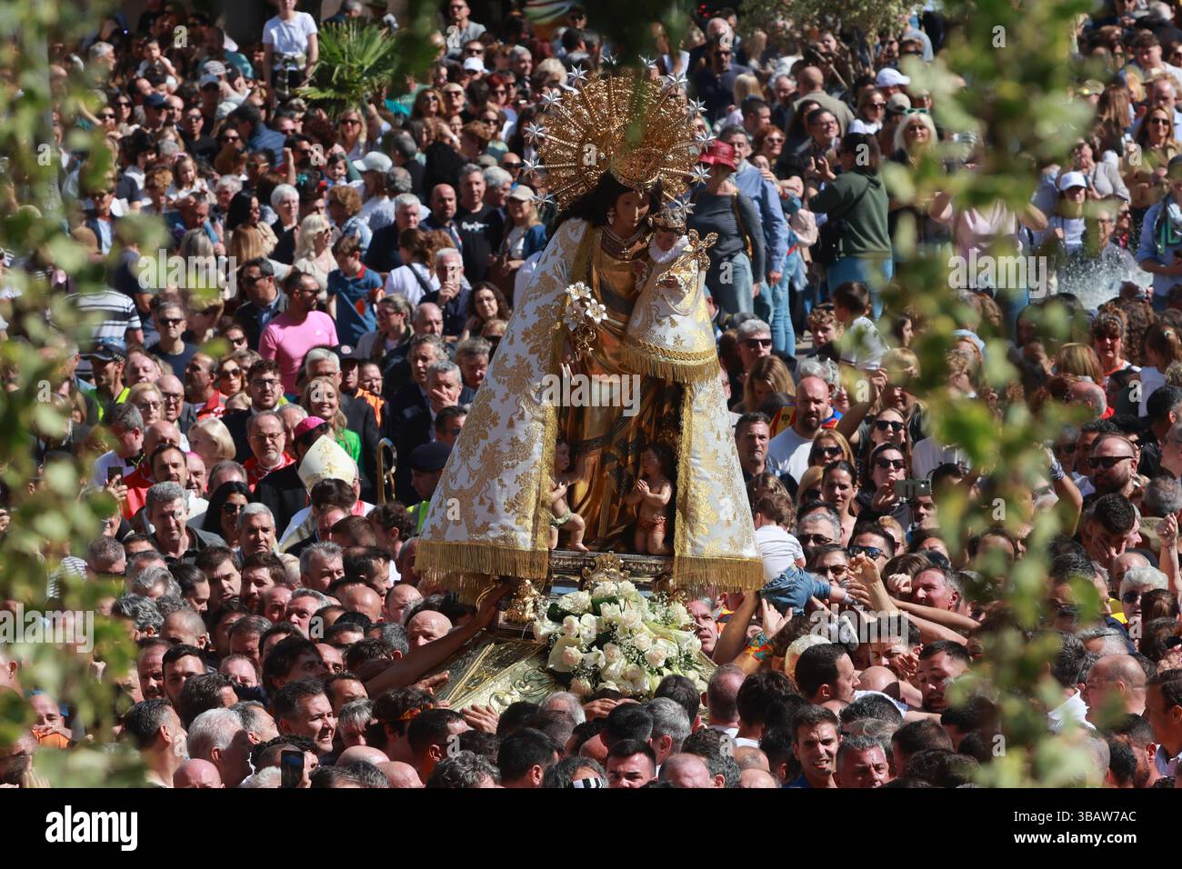 A crowd gathers in Valencia for the traditional transfer of the Virgin of the Forsaken (Virgen de los Desamparados) from her basilica to the cathedral Stock Photo