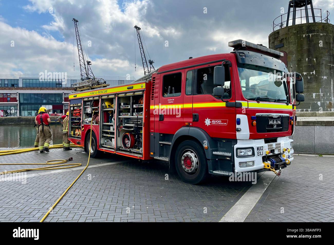 An Avon Fire & Rescue Fire Engine on a routine training exercise near the Bristol Floating Harbour. Bristol, England, United Kingdom. 26th March 2025. - Smartphone Captured Stock Image