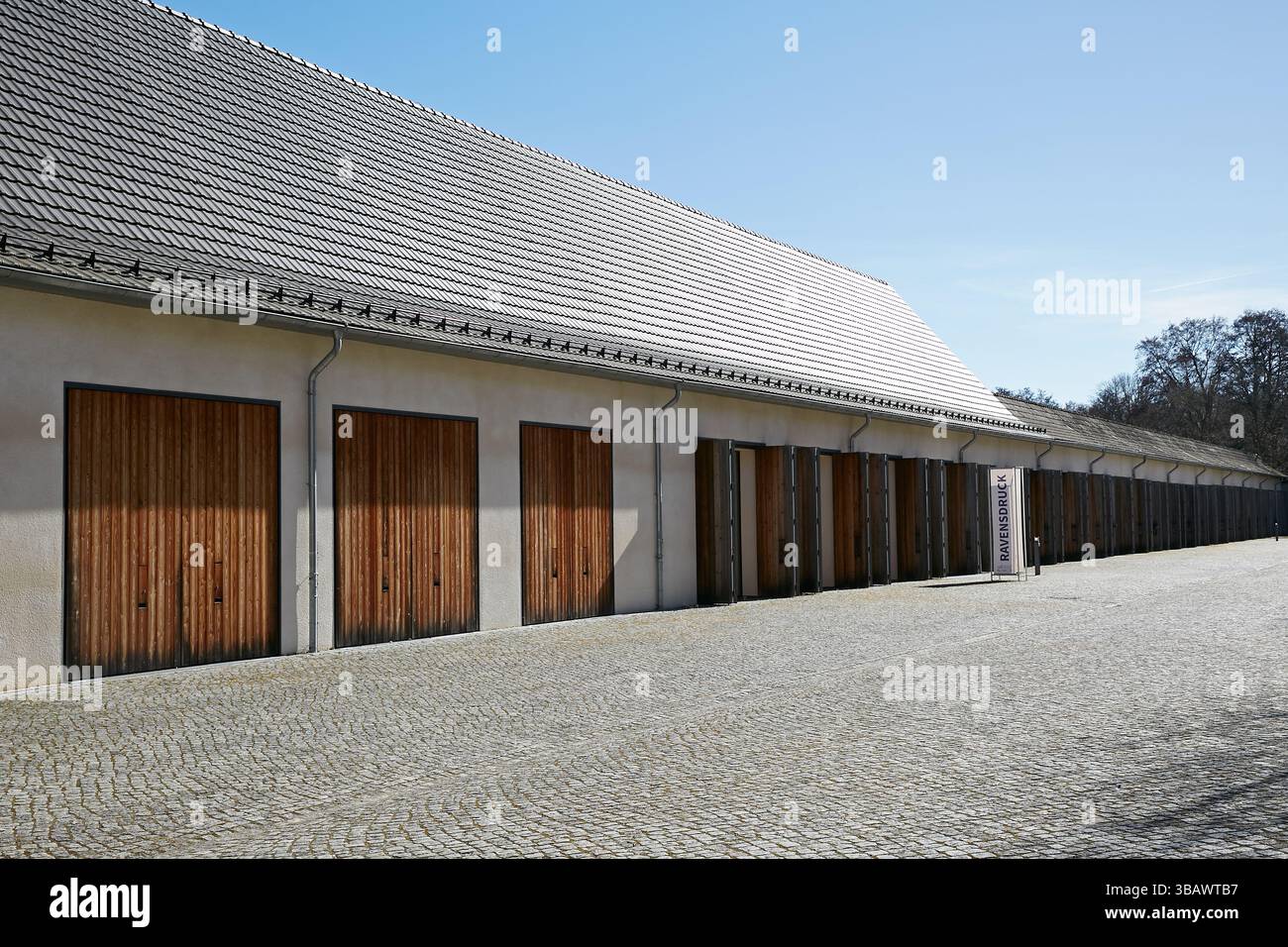 18.03.2025, Germany, Brandenburg, Fuerstenberg / Havel - The garage wing on the grounds of the Ravensbrueck Memorial. Part of the buildings are used f Stock Photo