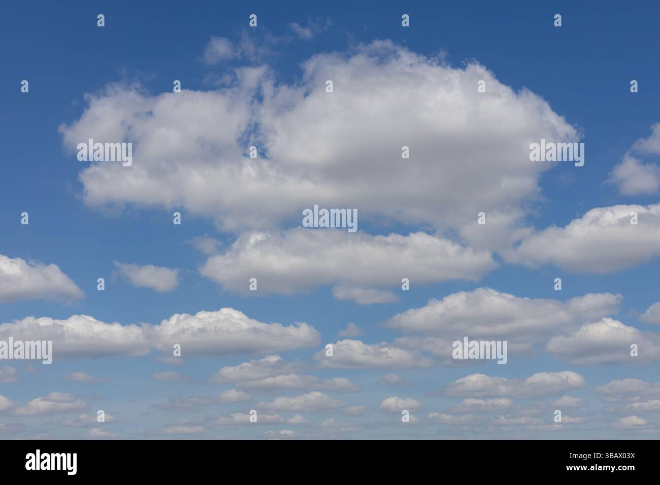 Blue Sky with Scattered White Clouds Stock Photo