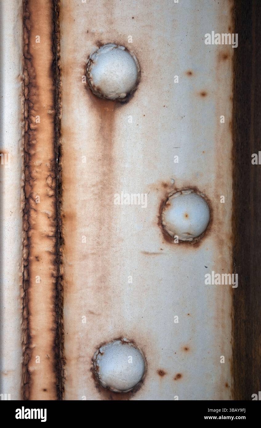 Riveted rusty metal texture background Stock Photo