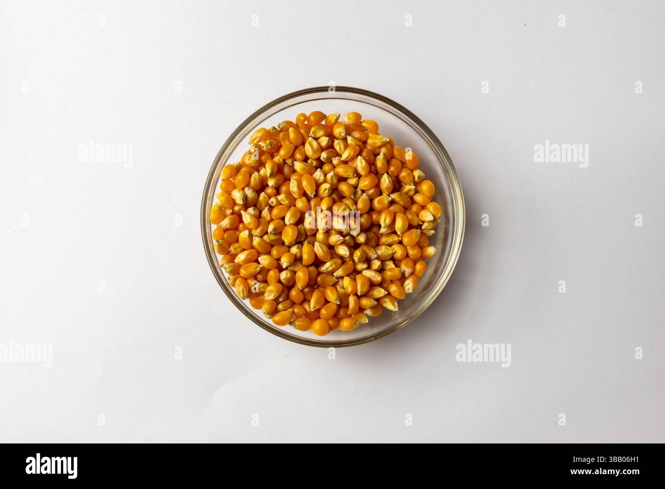 Raw popcorn - white background Stock Photo