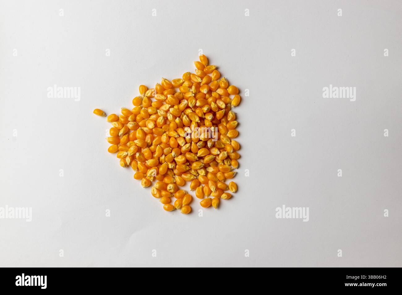 Raw popcorn - white background Stock Photo