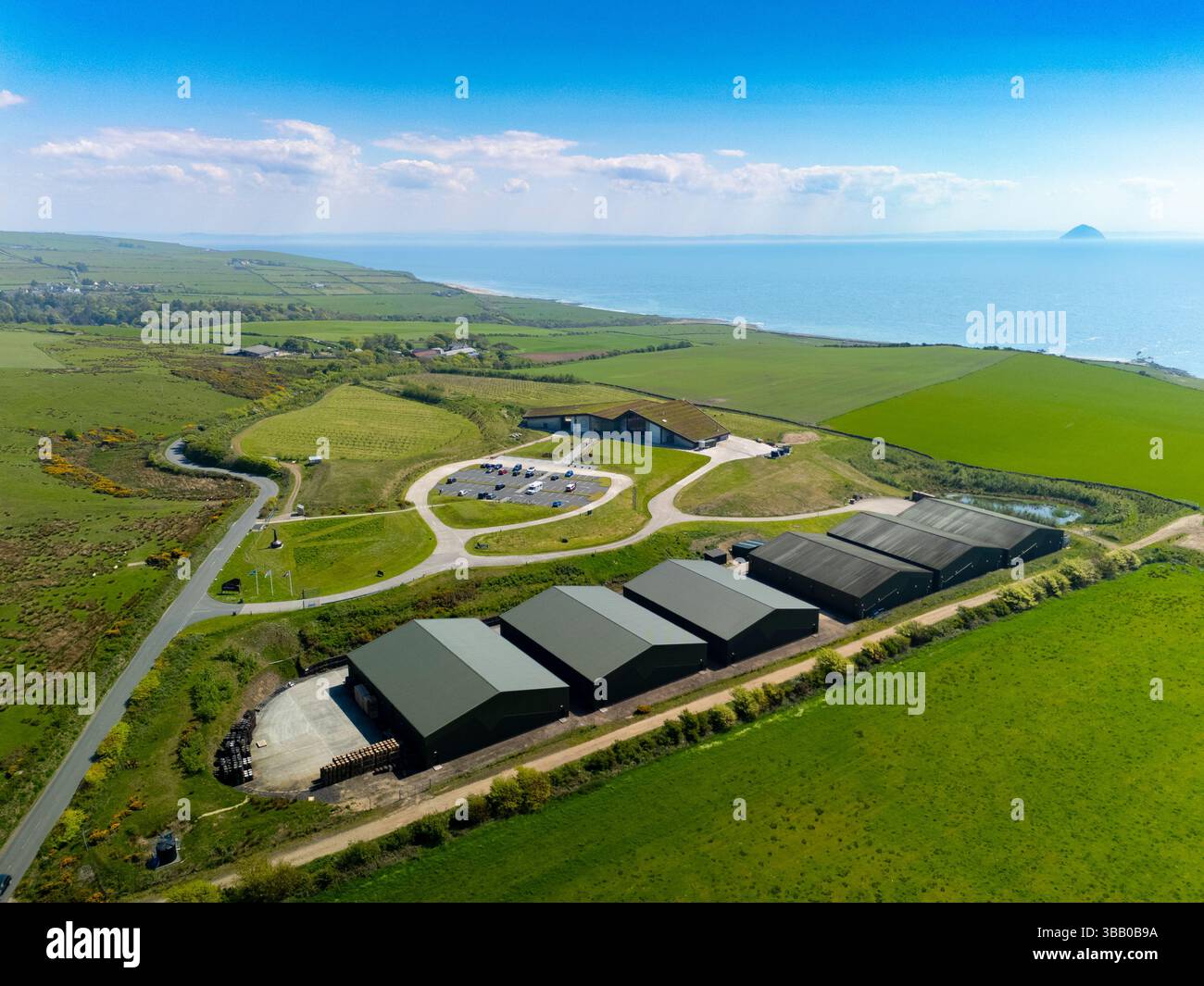 Aerial view of Lagg Distillery in Lagg, Isle of Arran, Scotland, UK. Owners Isle of Arran Distillers Ltd Stock Photo