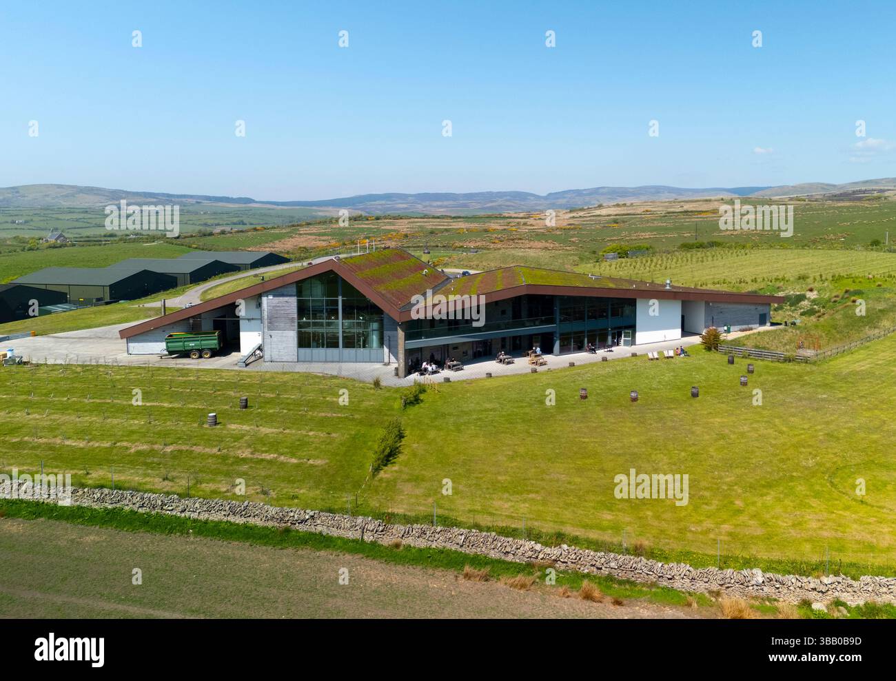 Aerial view of Lagg Distillery in Lagg, Isle of Arran, Scotland, UK. Owners Isle of Arran Distillers Ltd Stock Photo