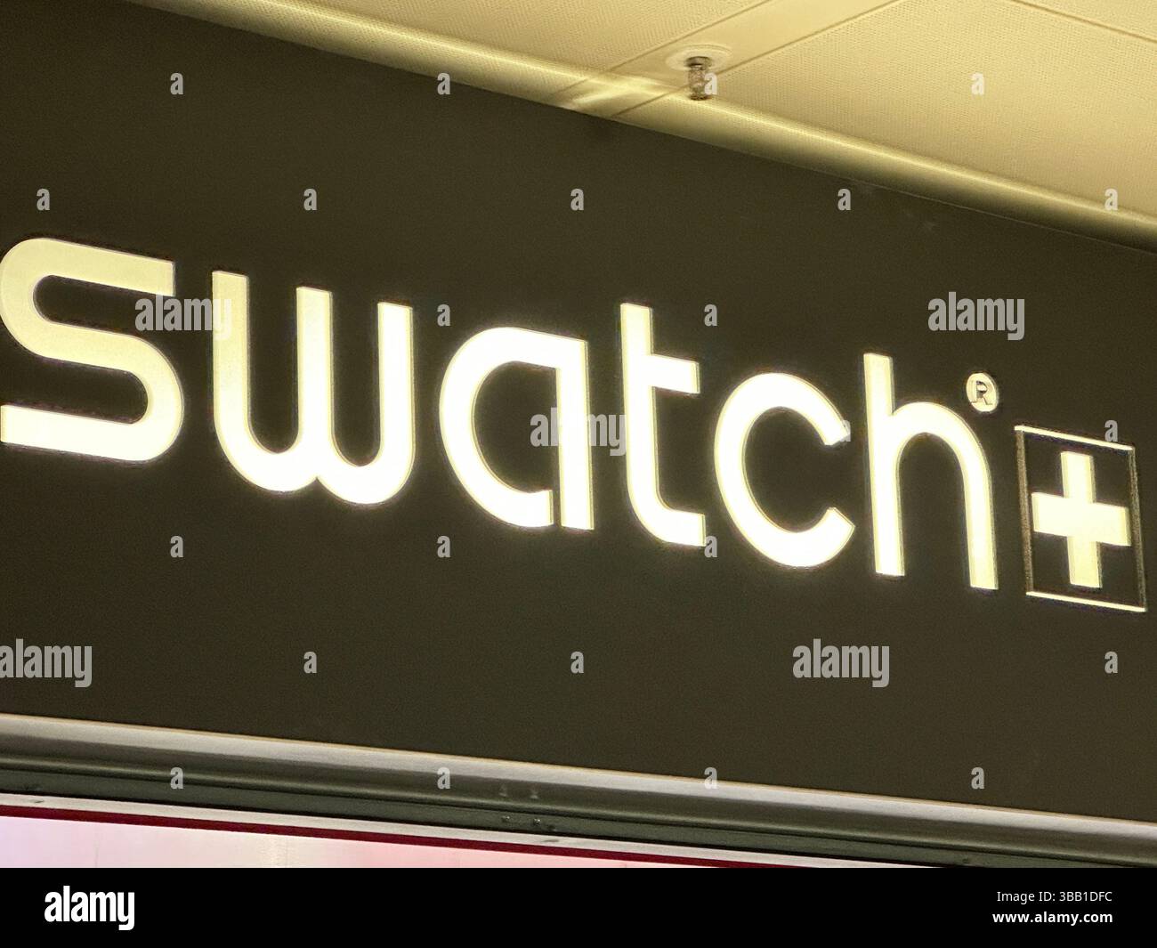 Geneva, Switzerland - Jan 16, 2023: Swatch store in Geneva. - Smartphone Captured Stock Image