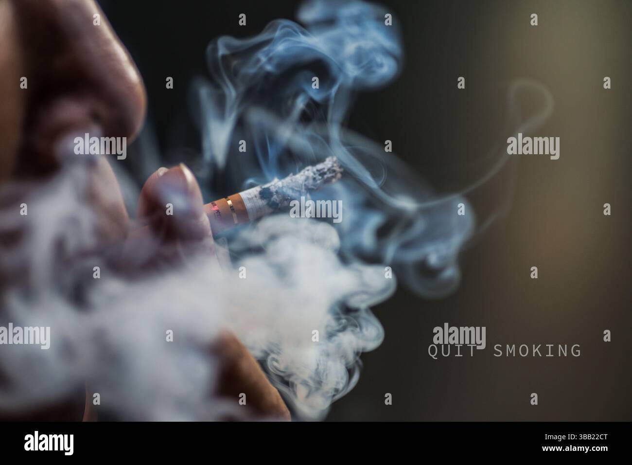 Man puffing cigarette hi-res stock photography and images