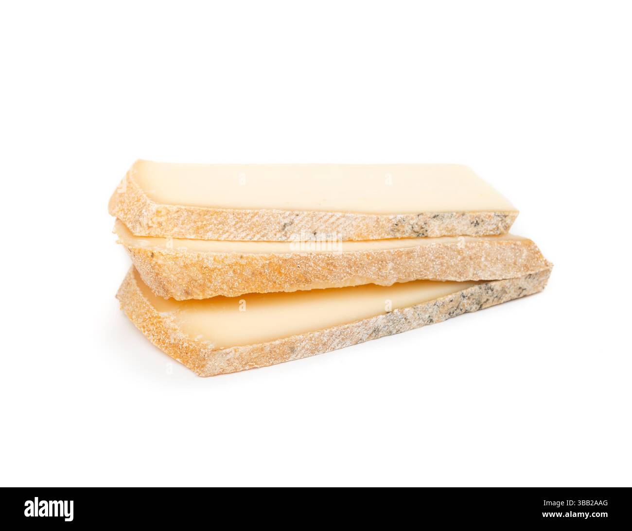 Isolated Raclette slices. Stack of fresh sliced raclette cheese ...