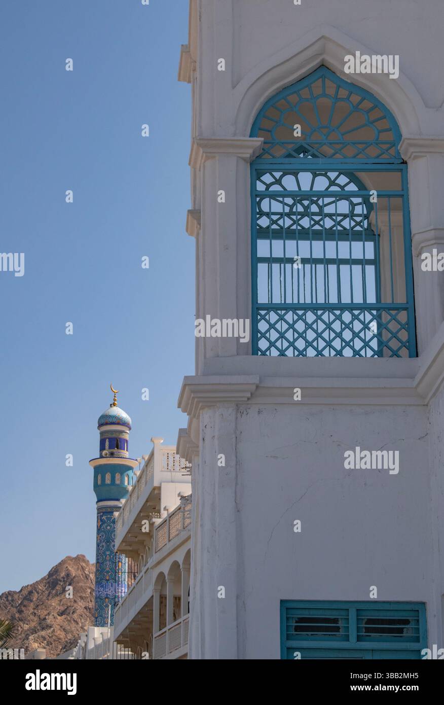 Al Rasool Oman: white house with blue windows on Mutrah Corniche and the famous ...