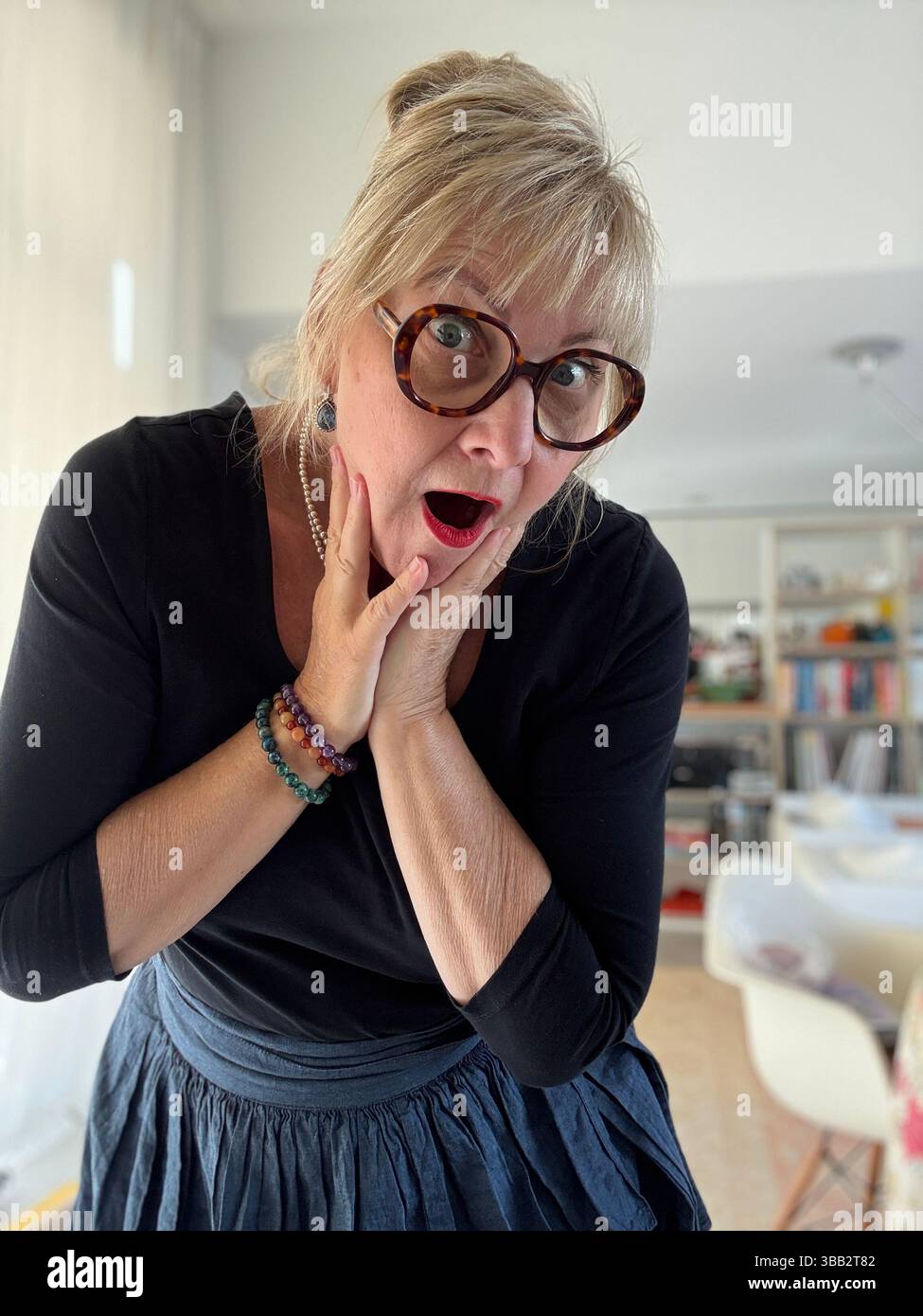 Moods of 60 year old woman - Smartphone Captured Stock Image