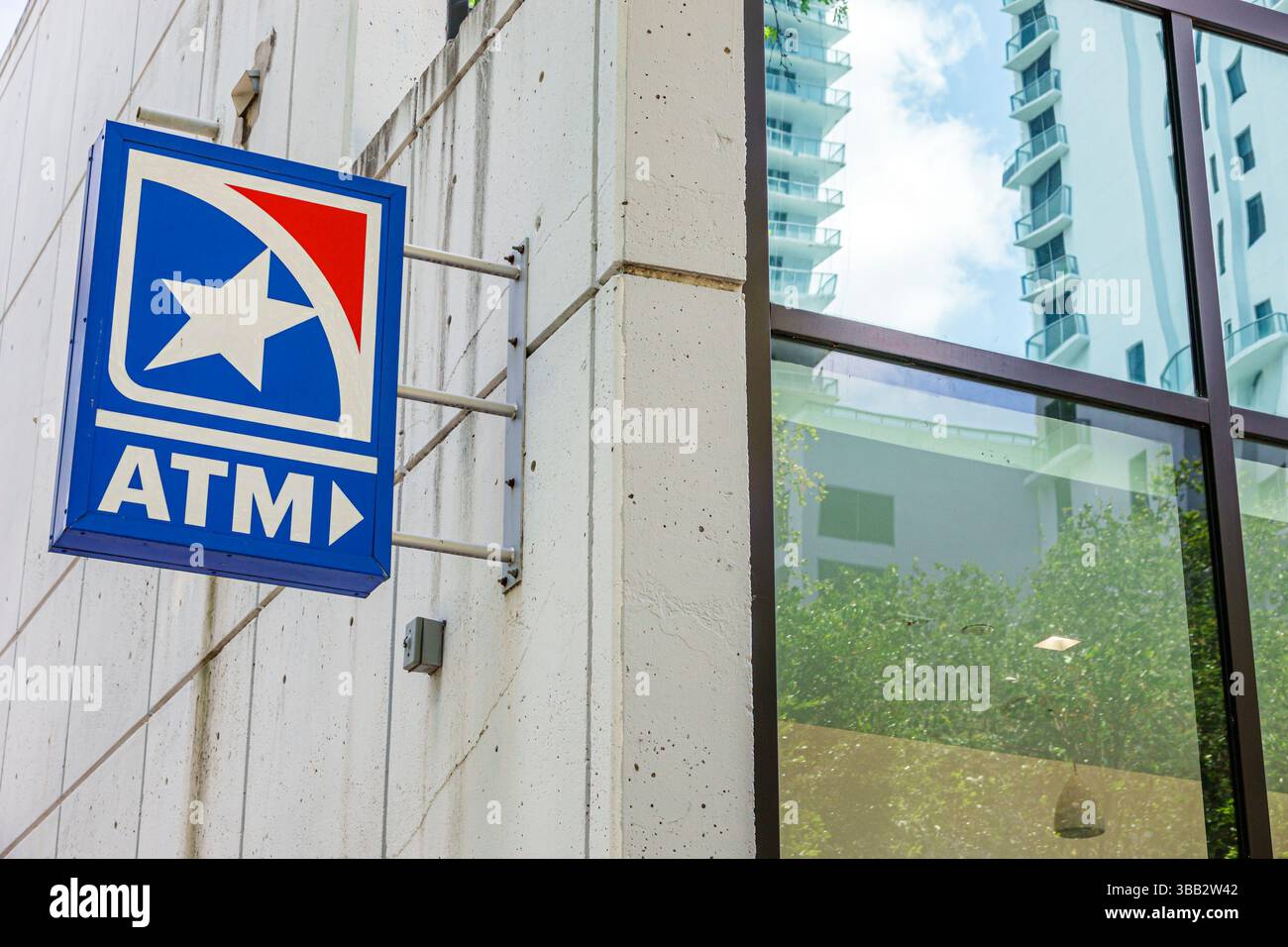 Miami Florida,Brickell Financial District,Brickell Avenue,exterior wall of building,ATM cash machine sign,red blue star logo,financial services,bankin Stock Photo