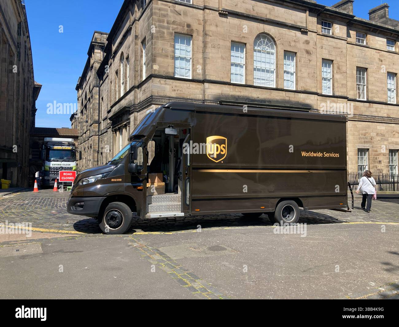 ups delivery van parked in street, out for delivery dropping off parcels, Edinburgh Scotland - Smartphone Captured Stock Image
