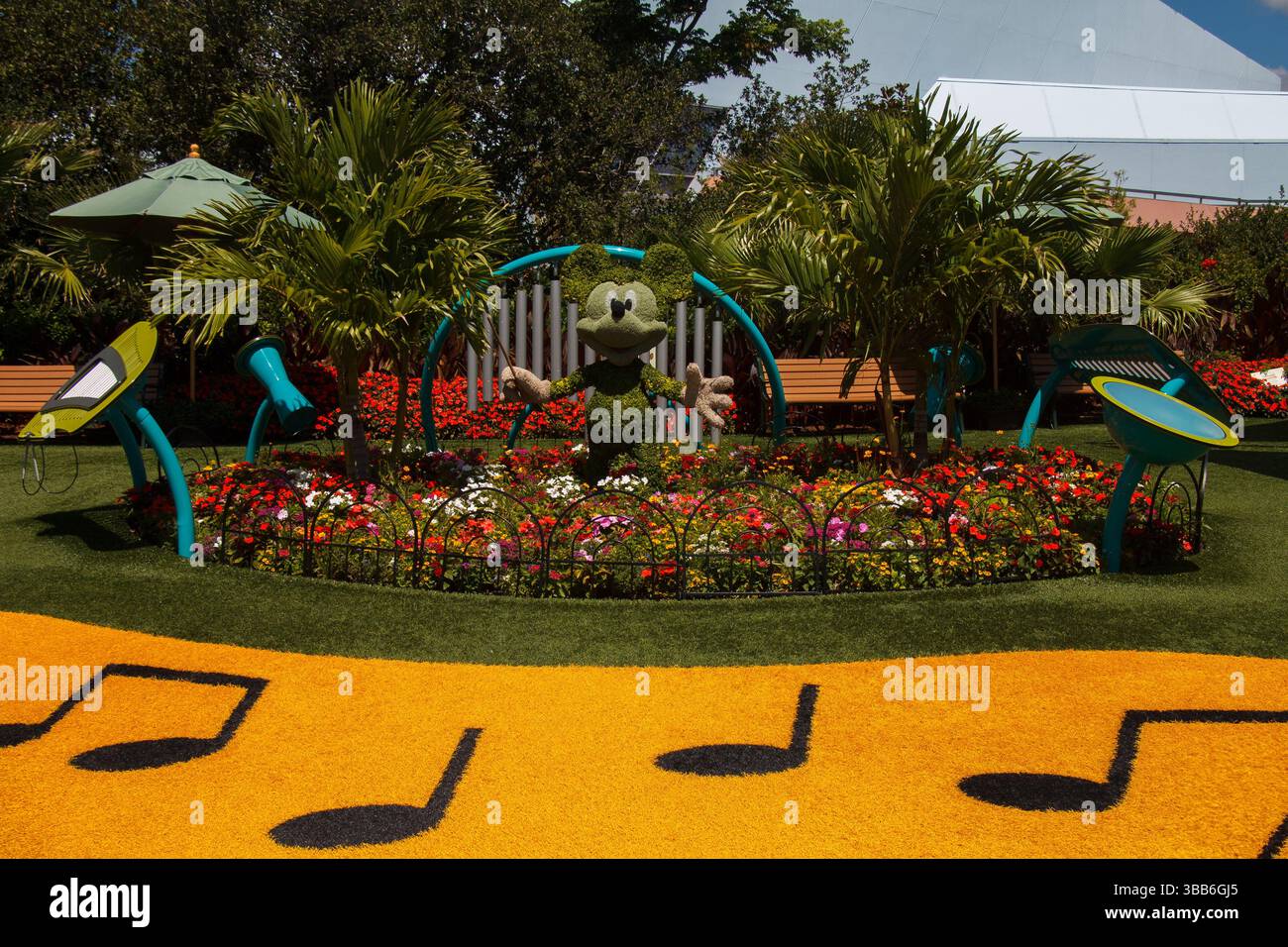 The Mickey Mouse cartoon character at the flower and garden topiary ...