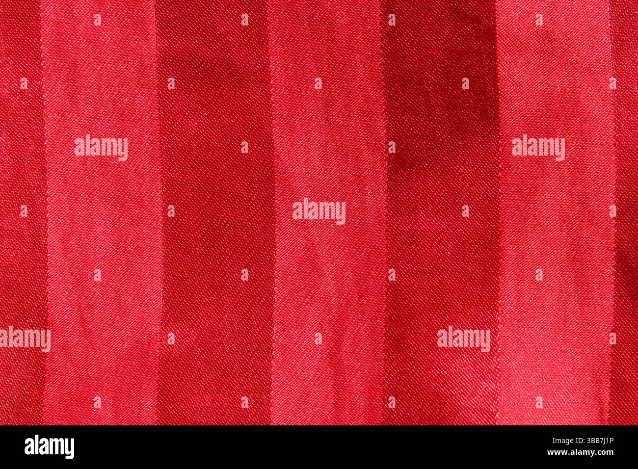 Red fabric with vertical lines textured abstract background Stock Photo