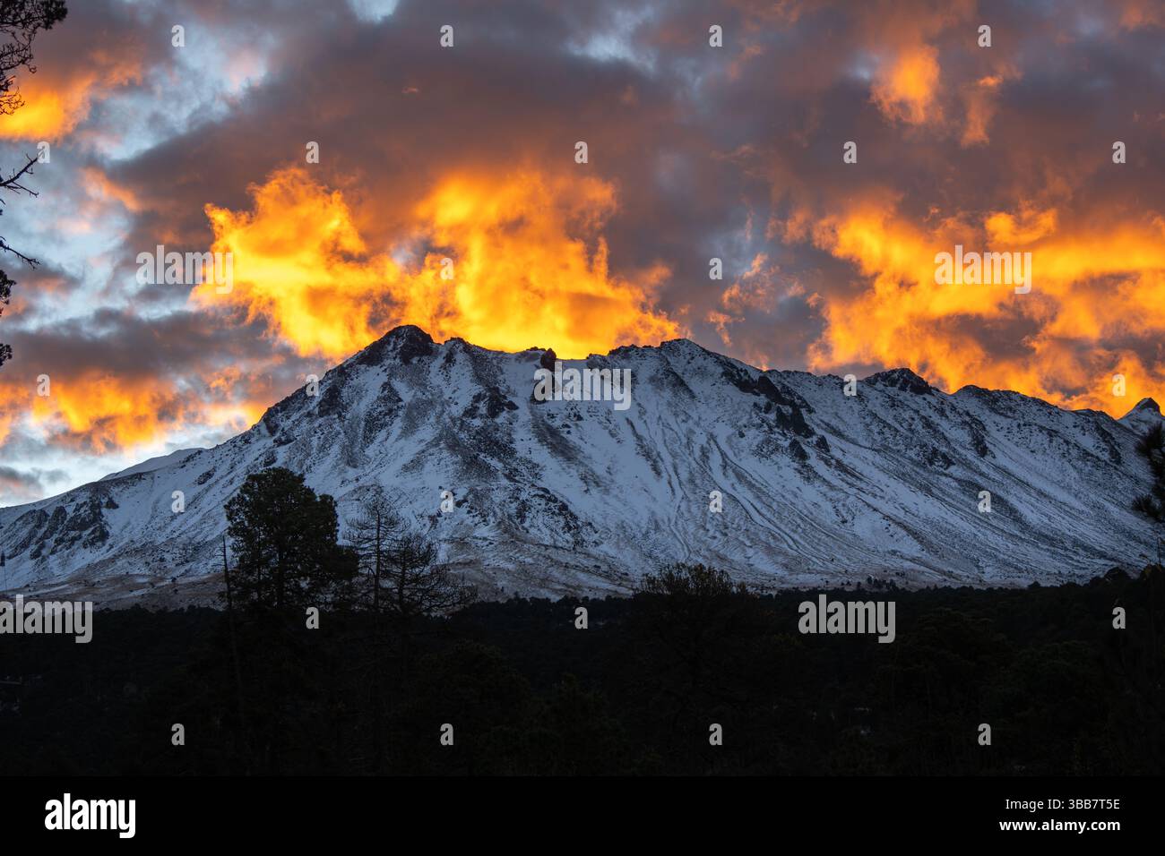 beautiful snowy landscape of Snow-Capped Volcano Nevado de Toluca ( Xinantecatl ) at Sunrise in Toluca state in Mexico. Stock Photo