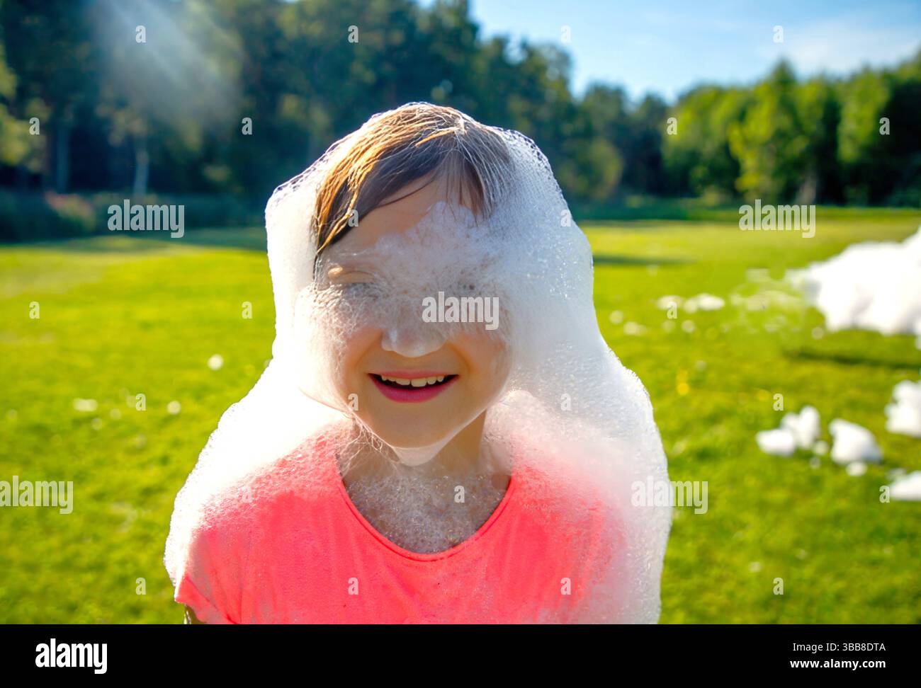 Girl covered in soap bubbles hi-res stock photography and images - Alamy