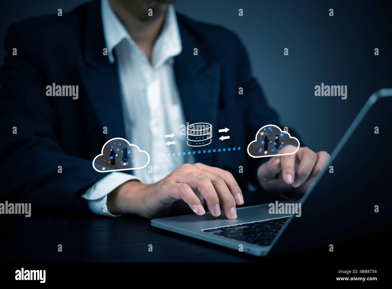 Businessman using cloud computing technology for data transfer and storage. Concept of cloud computing, data security, online storage, network infrast Stock Photo