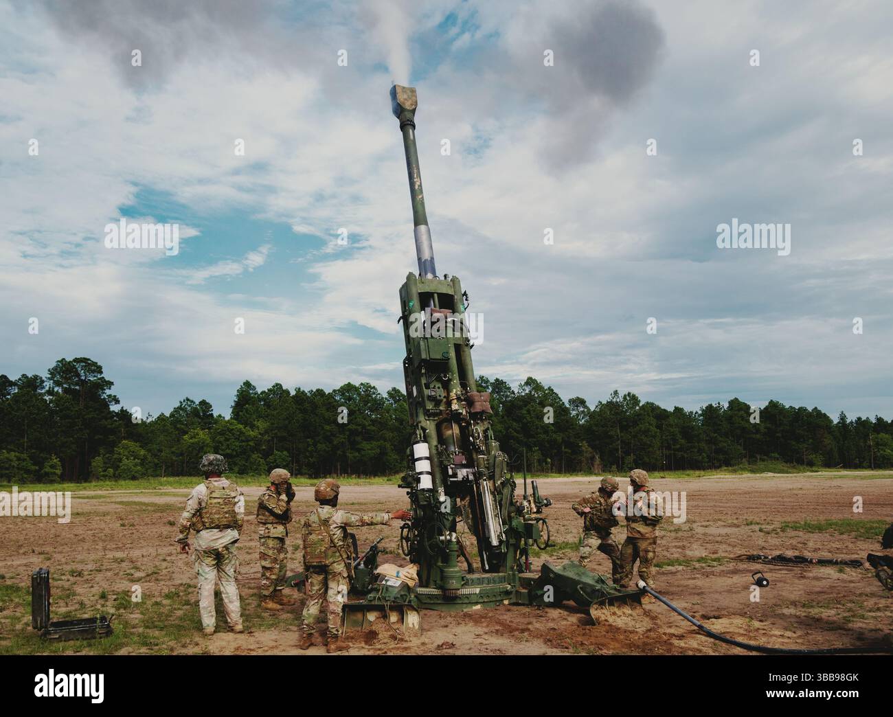 Paratroopers assigned to the 82nd Airborne Division, fire a M777 towed ...