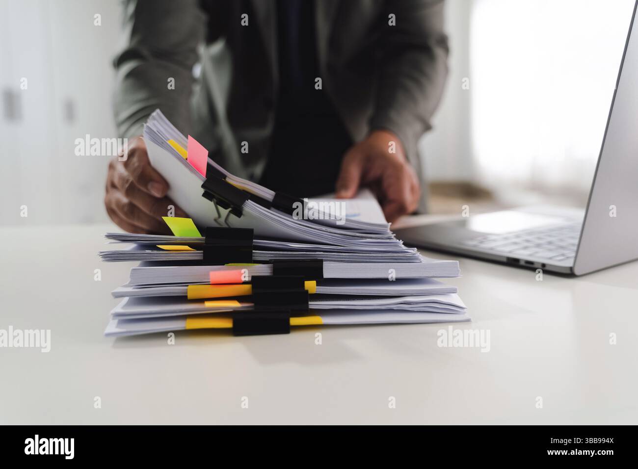 Notes And Documents A pen signing a document person organizing documents with colorful ...