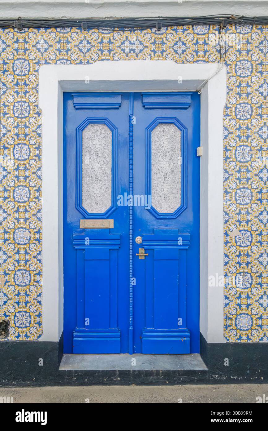 Vibrant Blue Door with Decorative Tiles, Azores. Eye-catching bright ...