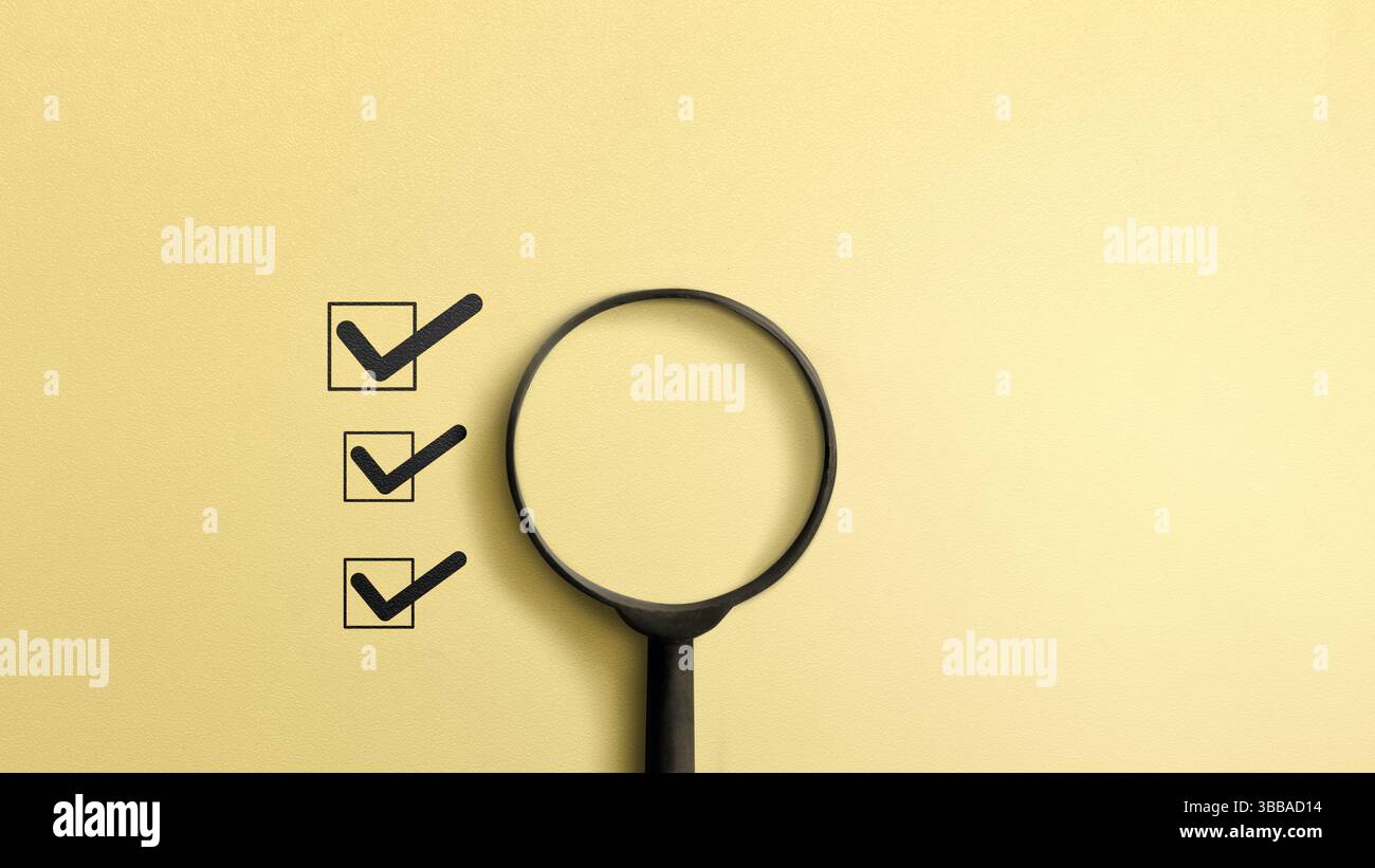 Magnifying glass with checkmark on checkbox with yellow background ...
