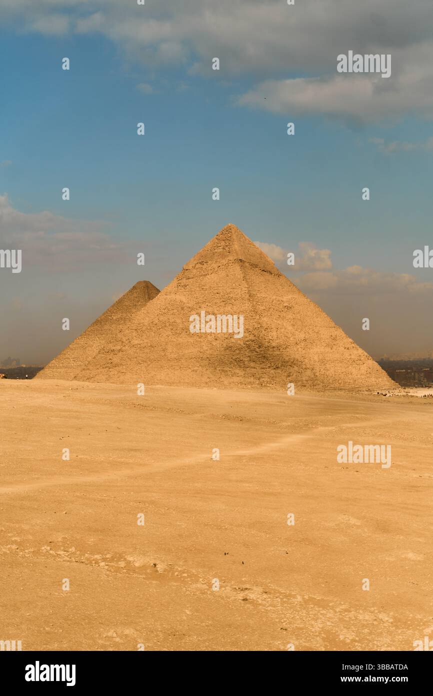 The Majestic Pyramids of Giza Stand Tall Against a Dramatic, Cloudy Sky ...