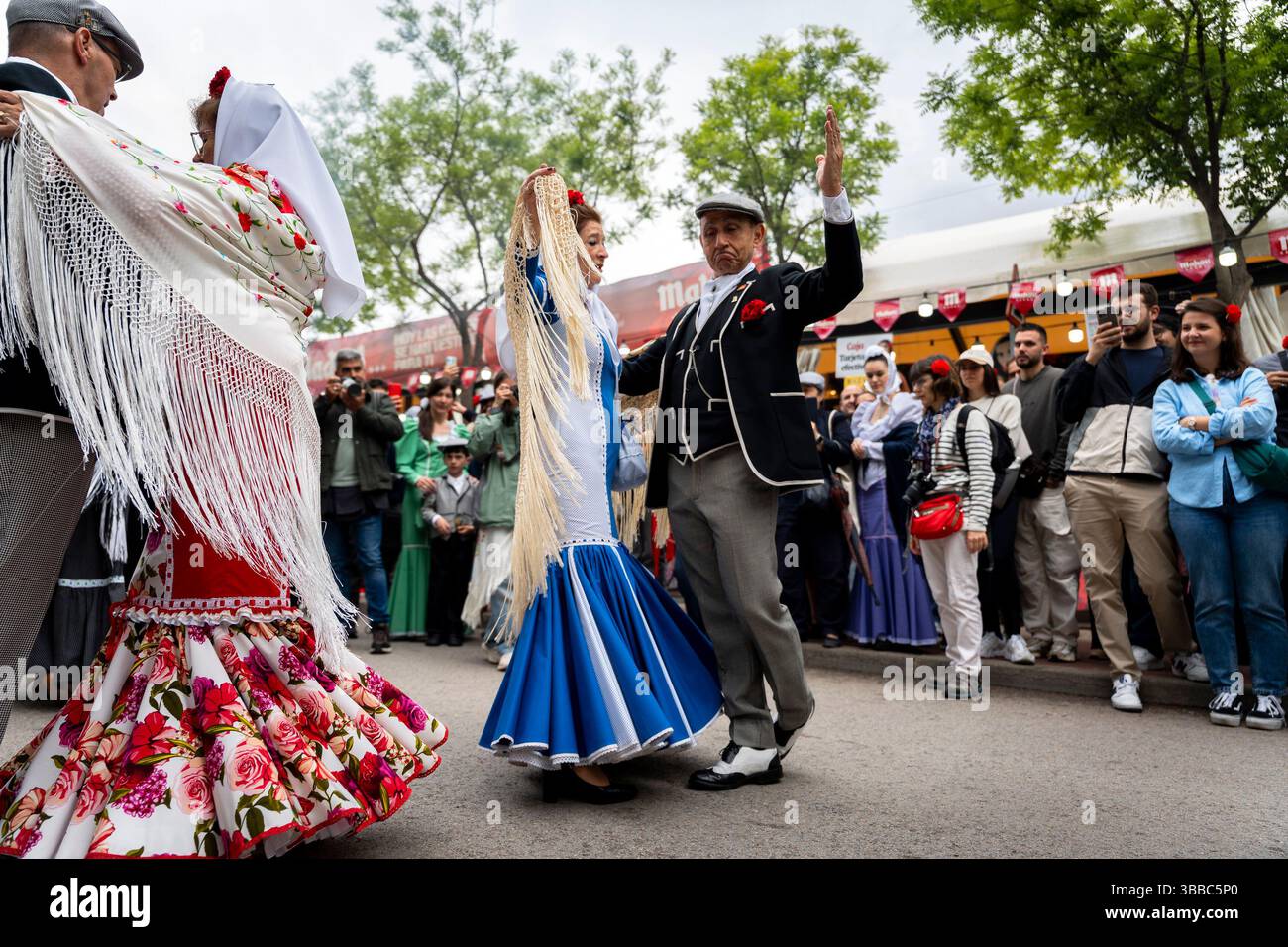 People Wearing The Traditional Madrid Costumes Known As chulapo And 