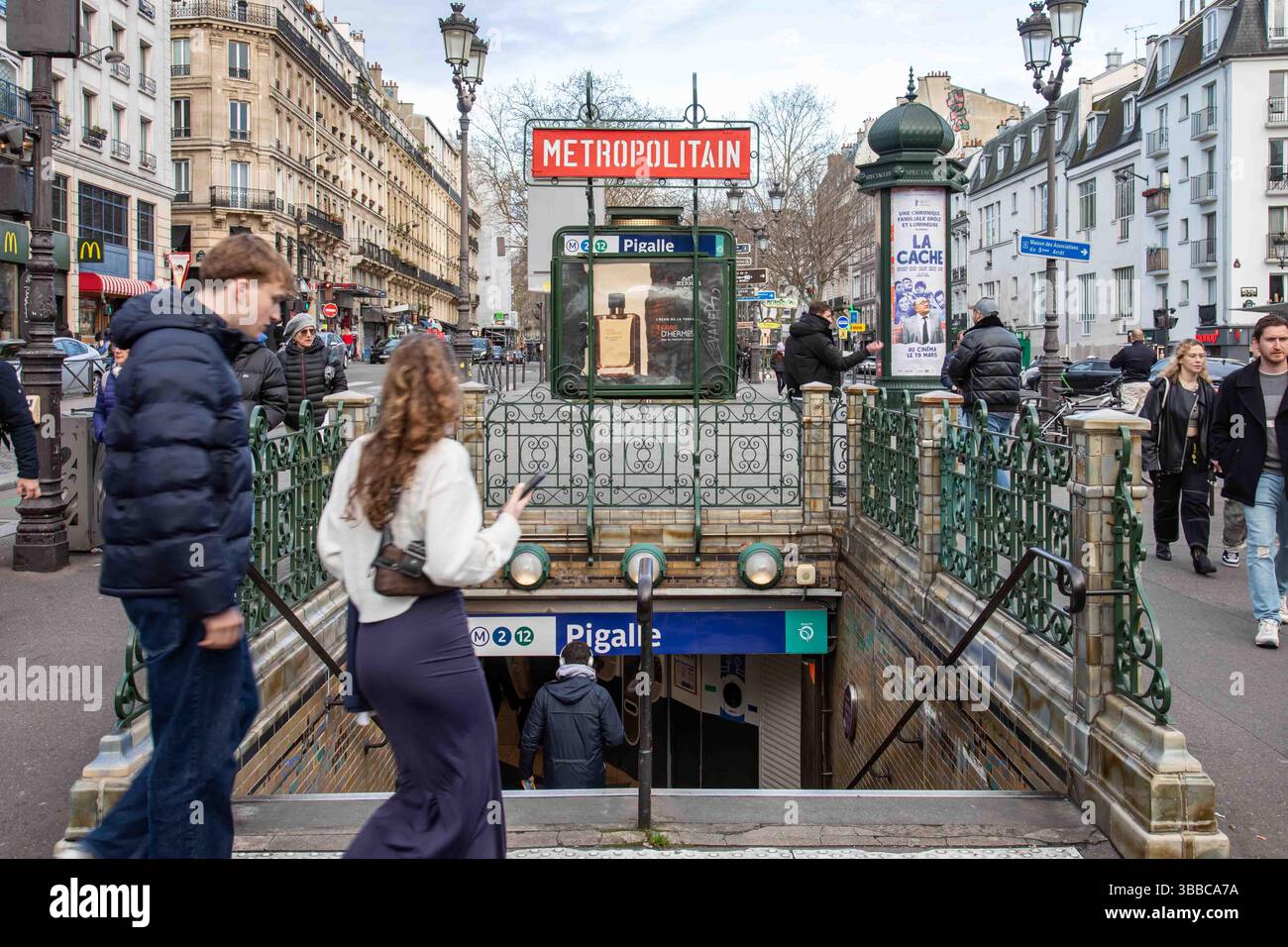 Passengers entering Pigalle metro station in Montmartre district of Paris, France Stock Photo