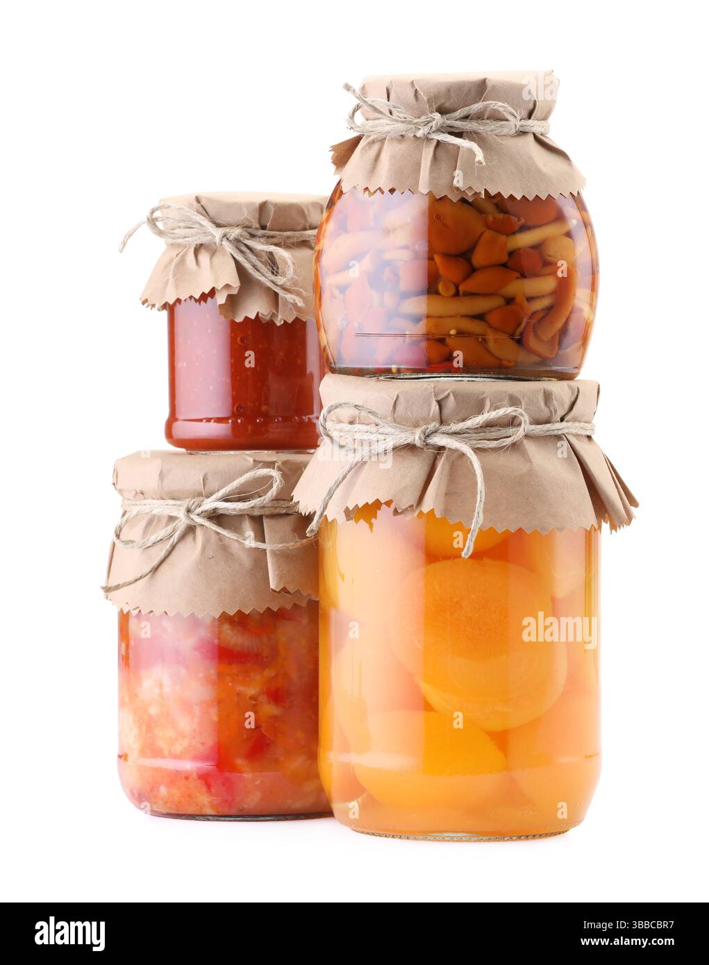 Many jars with different pickled products isolated on white Stock Photo