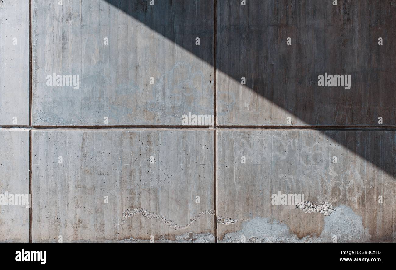 Wall surface made of large concrete blocks Stock Photo