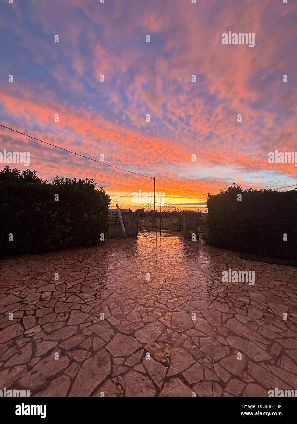 Sunset with rain - Smartphone Captured Stock Image