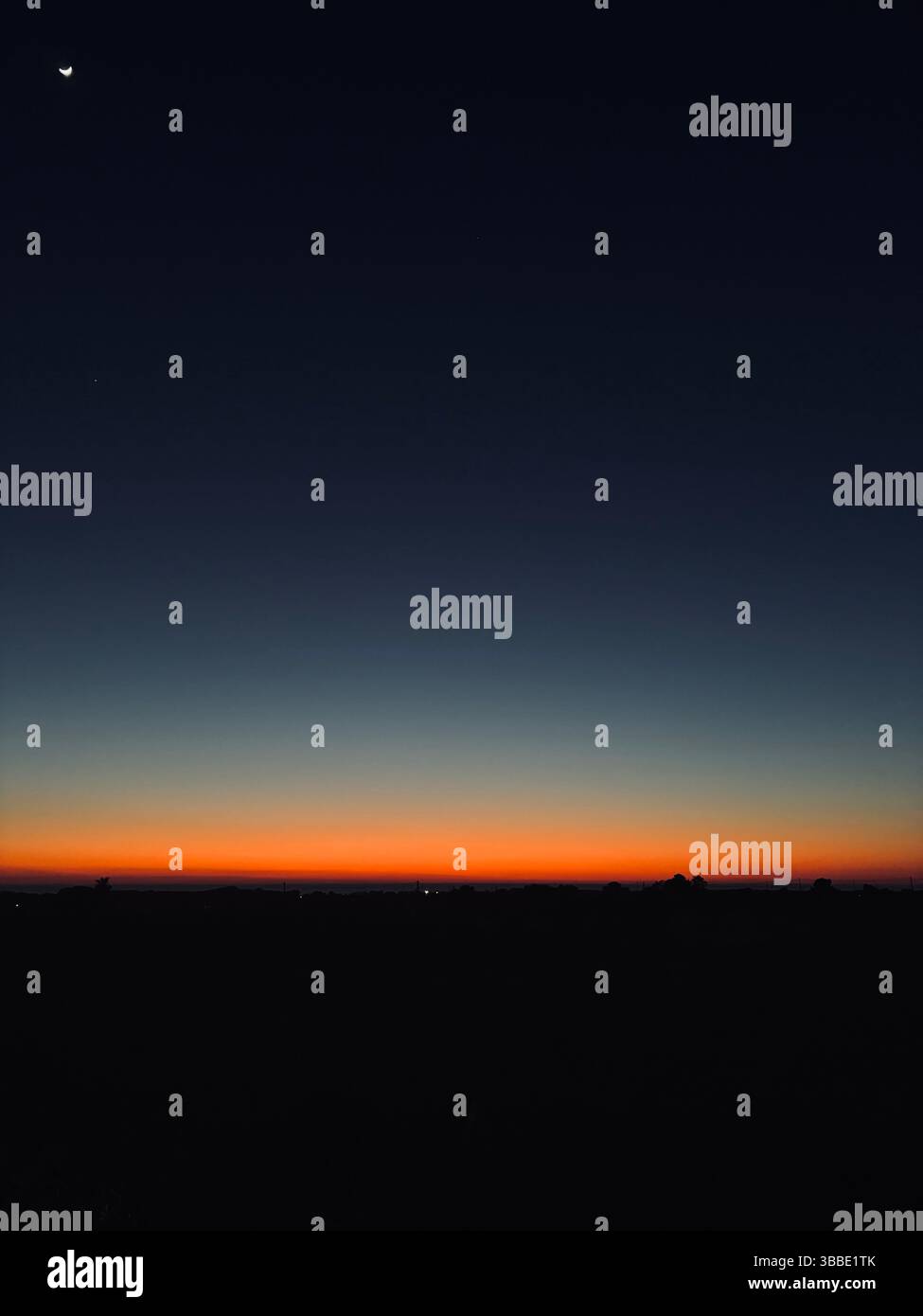 Sunset and Moon - Smartphone Captured Stock Image