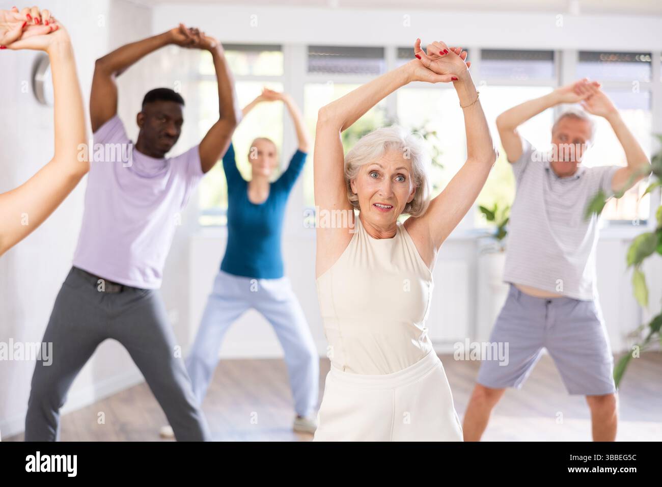 Multiethnic senior people training hi-res stock photography and images ...