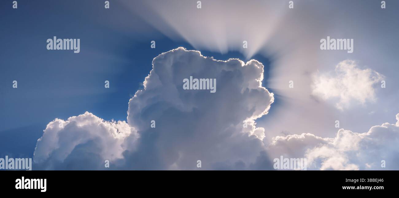 Sun shining through the heavenly beautiful clouds Stock Photo - Alamy