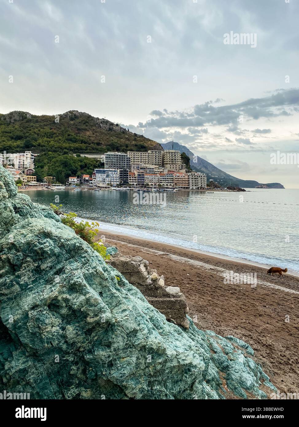 View from blue rock on empty beach in coastal town Rafailovici ...