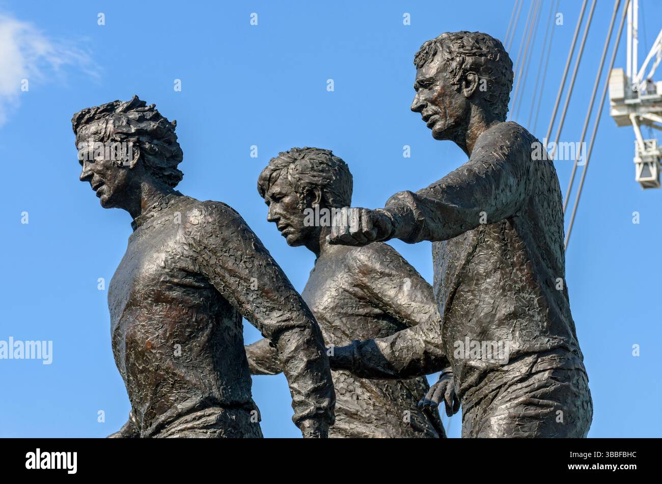 Statue of Manchester City trio Colin Bell, Francis Lee, and Mike Summerbee, by sculptor David Williams-Ellis.  Etihad Stadium, Manchester, England, UK Stock Photo