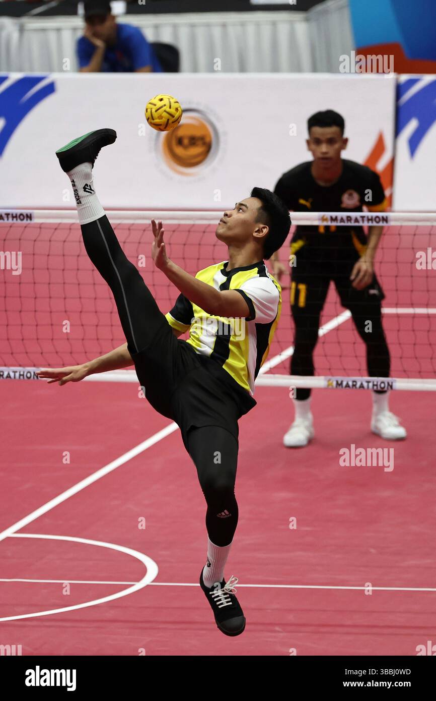 KUALA LUMPUR, KUL - MAY 16:Abdul Raziq Waqiuddin Abdul Rahman kick the ...