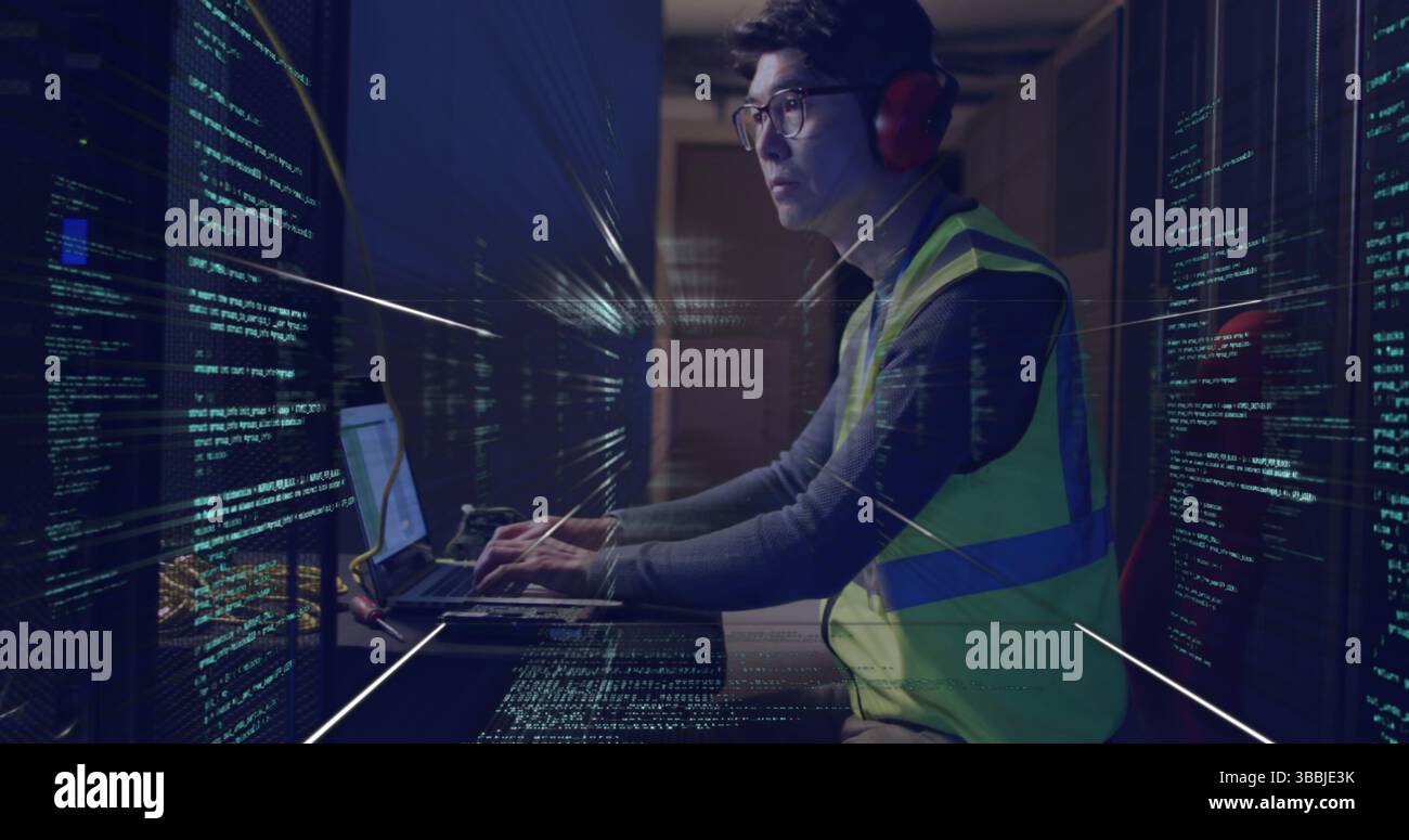 Image of data processing over asian man working in server room Stock Photo