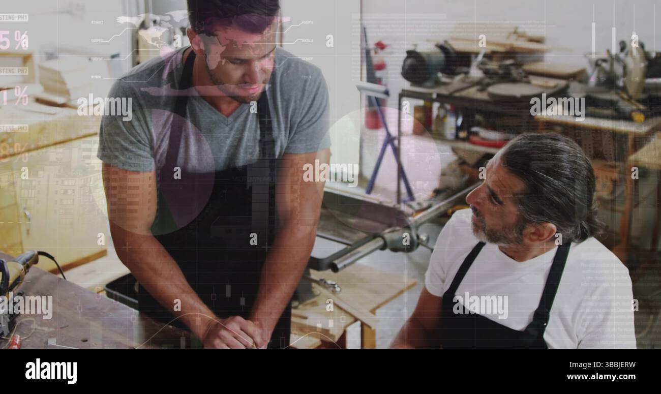 Image of financial graphs over caucasian men working in carpentry workshop Stock Photo