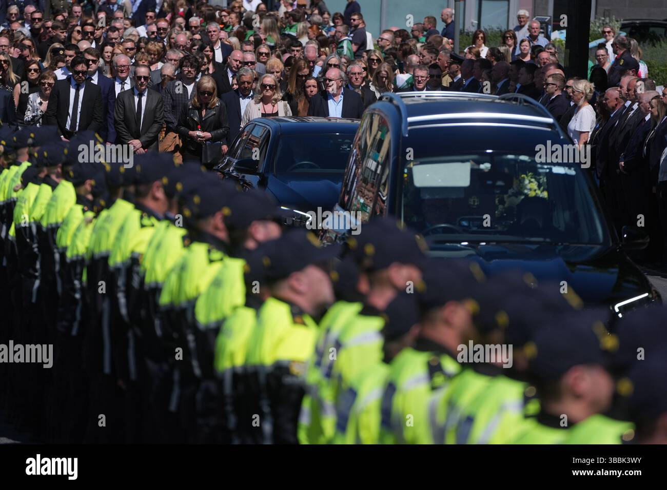 Garda officers line the route as the funeral cortege for garda officer ...