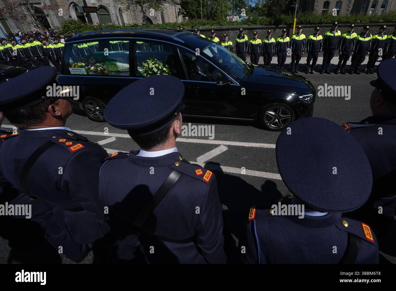 Garda colleagues and members of the DMR Roads Policing unit, form a ...